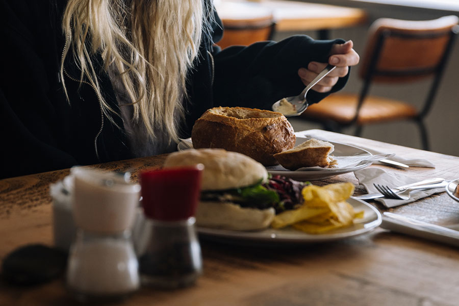 Person-eating-soup-St-Mawes-Cafe-gallery-Da-Bara-Bakery